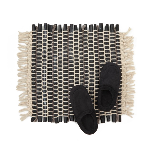 Reclaimed Bike Tube Rug | UncommonGoods