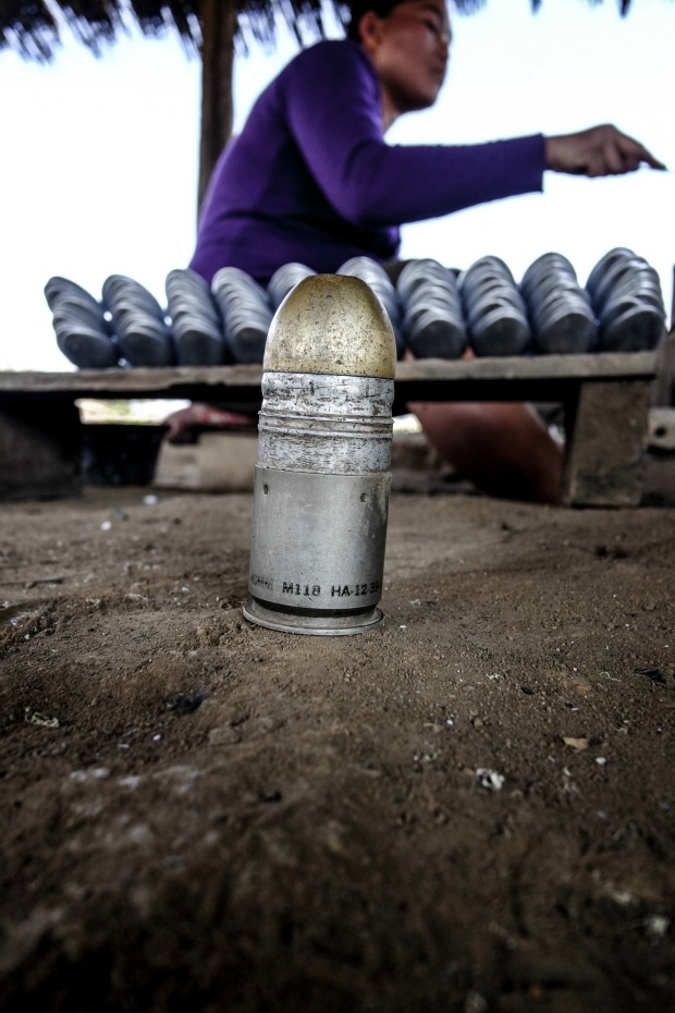 Laotian artisans transform bombs into beautiful jewelry.