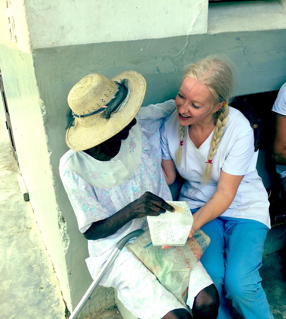 Dr. Alison Thompson delivering SolarPuffs in Haiti