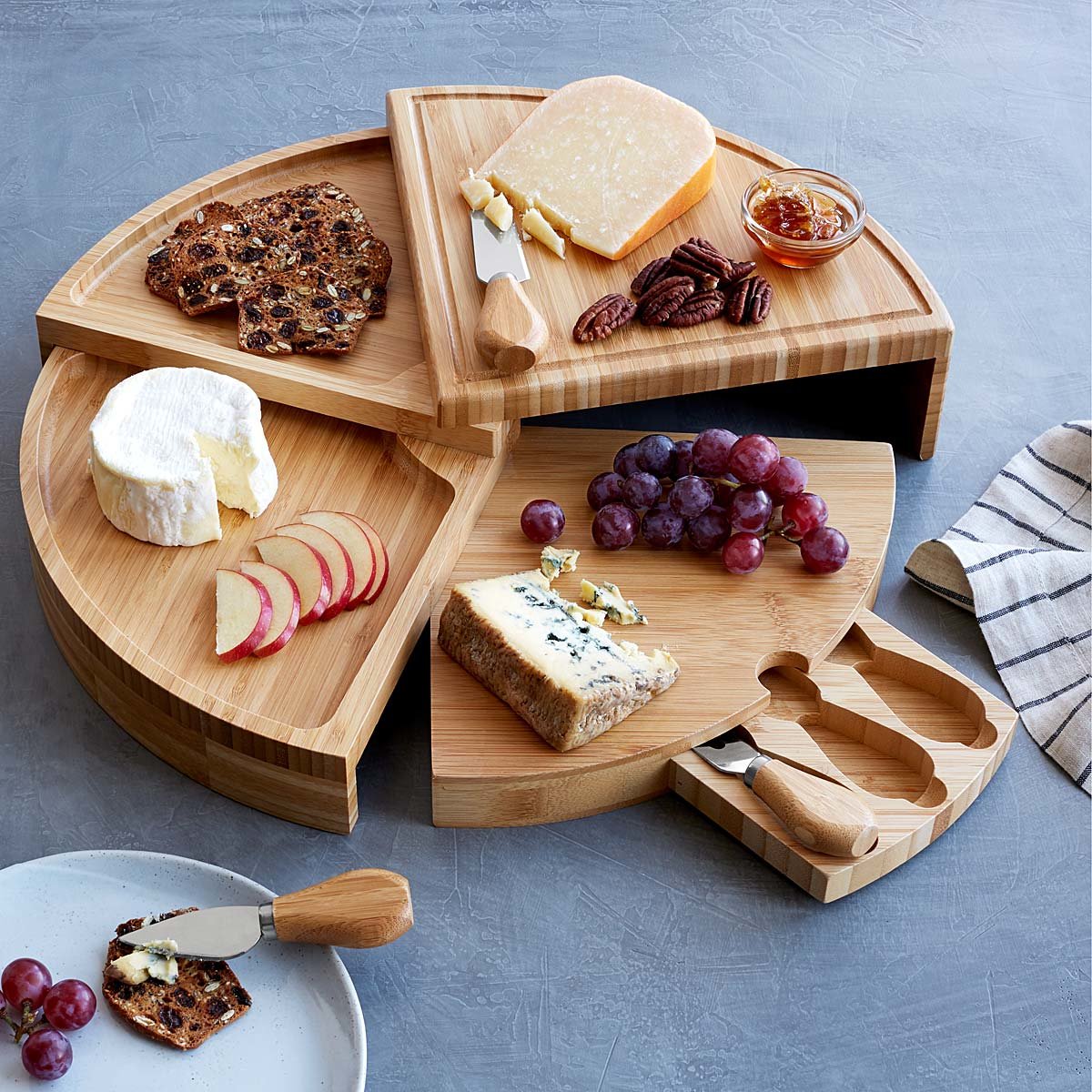 Compact Swivel Cheese Board with Knives | UncommonGoods