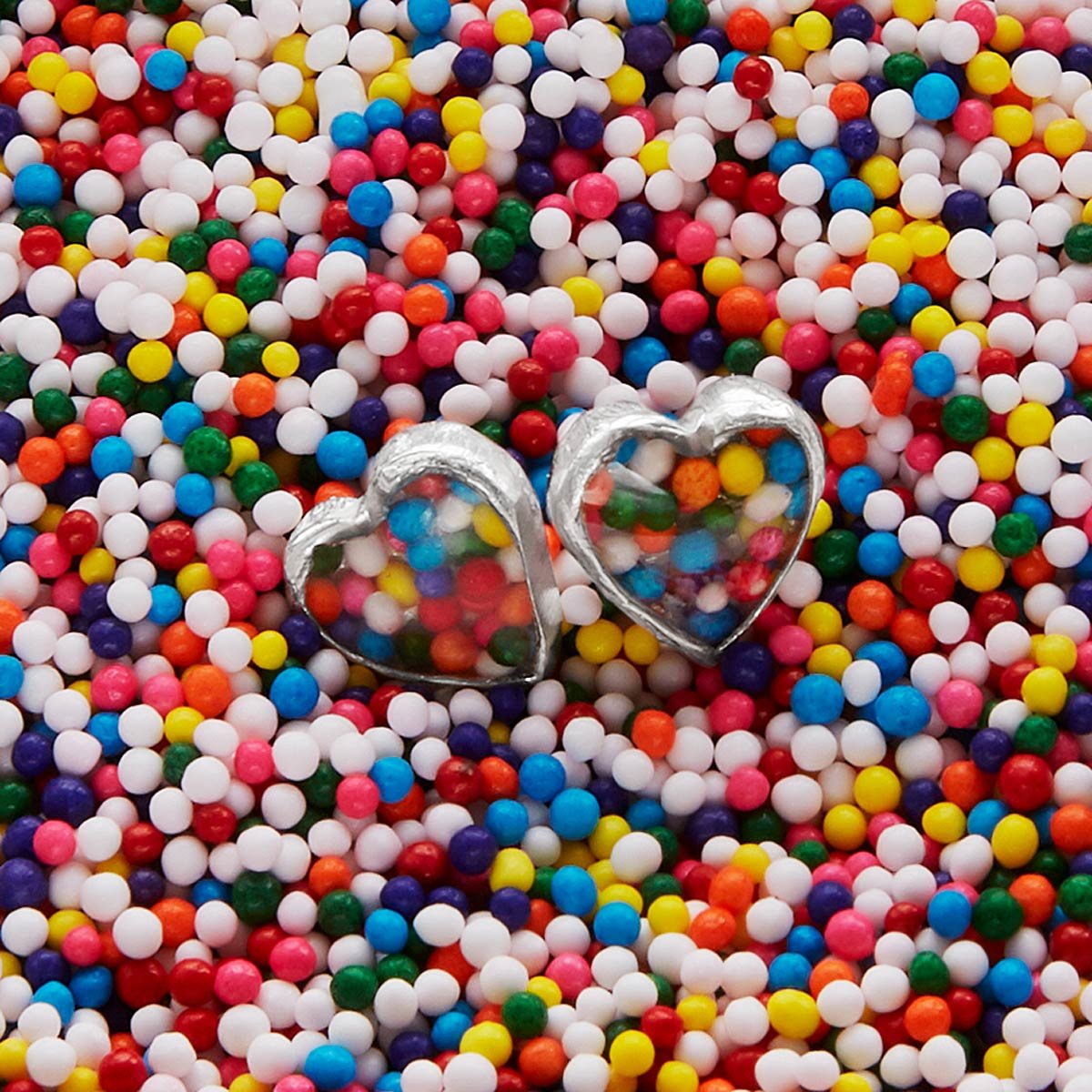 Sprinkle Heart Studs | UncommonGoods